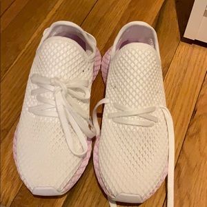 Brand new Adidas sneakers.